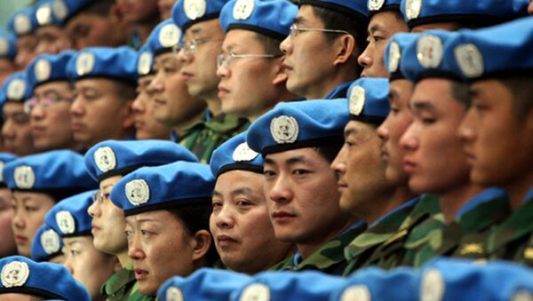 Chinese peacekeepers prepare to depart for their United Nations mission to Sudan from an airport in Zhengzhou, central Chinas Henan province, in this Tuesday, Jan. 16, 2007 file photo - Sputnik International