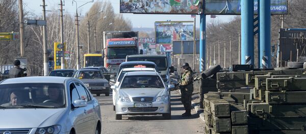 Checkpoint of DPR slef-defense fighters at the exit from Makeyevka. File photo Checkpoint of DPR slef-defense fighters at the exit from Makeyevka. File photo - Sputnik International