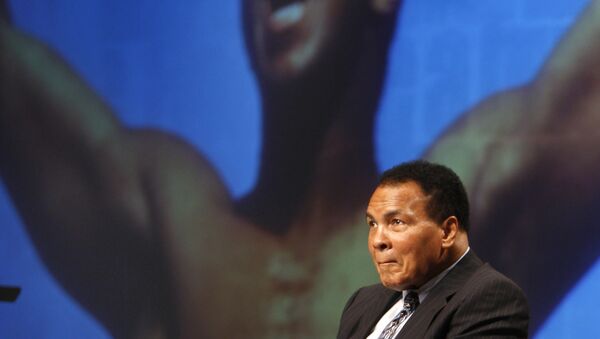 Muhammad Ali sits on the stage during an announcement marking a new philanthropic initiative in the Lexington Convention Center in Lexington, Ky., Tuesday, May 19, 2009 - Sputnik International