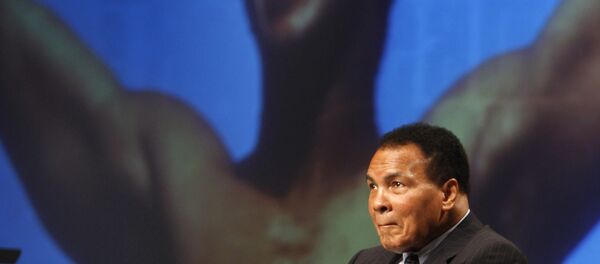 Muhammad Ali sits on the stage during an announcement marking a new philanthropic initiative in the Lexington Convention Center in Lexington, Ky., Tuesday, May 19, 2009 Muhammad Ali sits on the stage during an announcement marking a new philanthropic initiative in the Lexington Convention Center in Lexington, Ky., Tuesday, May 19, 2009 - Sputnik International