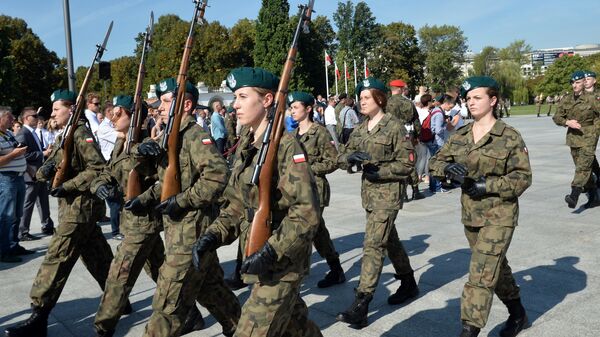 Polish cadets attend a parade in the Polish capital Warsaw to mark the 76th anniversary of the Soviet Union's invasion of Poland during World War II in Warsaw on September 17, 2015 - Sputnik International