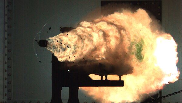 A photograph taken from a high-speed video camera during a  railgun firing at the Naval Surface Warfare Center on January 31, 2008 - Sputnik International