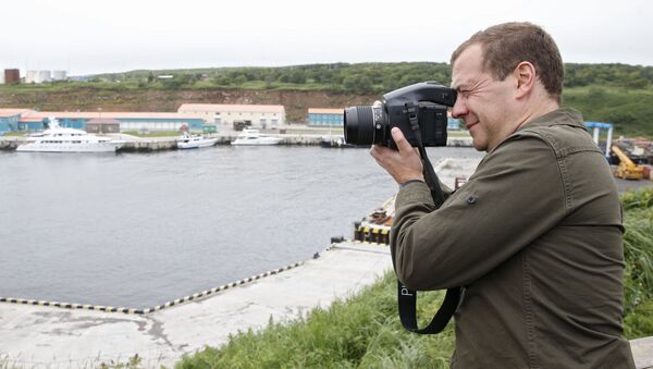 Russian Prime Minister Dmitry Medvedev on a tour of the Kurilsky port station in the township of Kitovy on Iturup, one of the Kuril Islands. (File) - Sputnik International