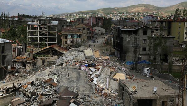 Buildings which were damaged during security operations and clashes between Turkish security forces and Kurdish militants, are seen in Yuksekova in the southeastern Hakkari province, Turkey, May 30, 2016. - Sputnik International