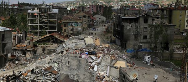 Buildings which were damaged during security operations and clashes between Turkish security forces and Kurdish militants, are seen in Yuksekova in the southeastern Hakkari province, Turkey, May 30, 2016. Buildings which were damaged during security operations and clashes between Turkish security forces and Kurdish militants, are seen in Yuksekova in the southeastern Hakkari province, Turkey, May 30, 2016. - Sputnik International
