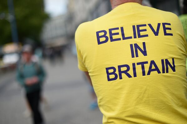 A campaigner wears a T-shirt bearing the slogan Believe In Britain as he attends an Anti-EU (European Union) United Kingdom Independence Party (UKIP) pro-Brexit campaign event, ahead of the forthcoming referendum, in Birmingham, central England, on May 31, 2016. A campaigner wears a T-shirt bearing the slogan Believe In Britain as he attends an Anti-EU (European Union) United Kingdom Independence Party (UKIP) pro-Brexit campaign event, ahead of the forthcoming referendum, in Birmingham, central England, on May 31, 2016. - Sputnik International