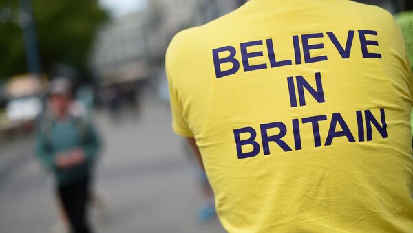 A campaigner wears a T-shirt bearing the slogan Believe In Britain as he attends an Anti-EU (European Union) United Kingdom Independence Party (UKIP) pro-Brexit campaign event, ahead of the forthcoming referendum, in Birmingham, central England, on May 31, 2016. - Sputnik International
