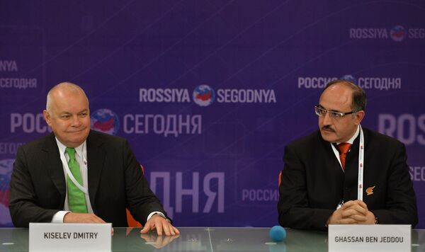 Dmitry Kiselev, left, Director General, Rossiya Segodnya International Information Agency, with Ghassan Ben Jeddou (Lebanon), Chairman of the Board of Directors, Al Mayadeen TV - Sputnik International