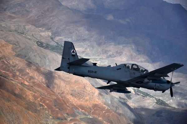 An A-29 Super Tucano flies over Afghanistan. - Sputnik International
