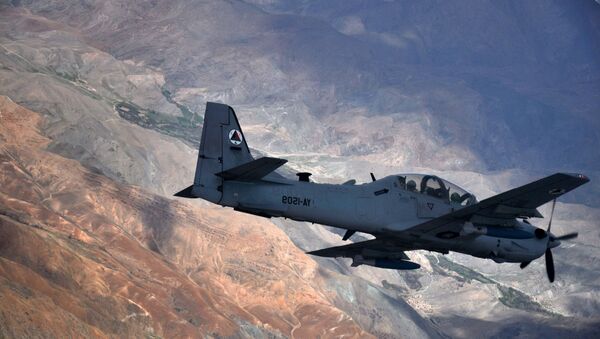 An A-29 Super Tucano flies over Afghanistan. - Sputnik International