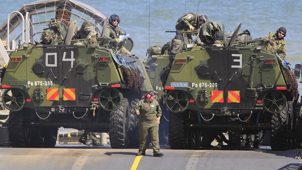 Soldiers park their amphibious vehicles on a ship as they participate in a massive amphibious landing during NATO sea exercises BALTOPS 2015  in Ustka, Poland, Wednesday, June 17, 2015 - Sputnik International