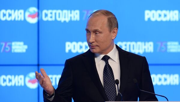 Russian President Vladimir Putin visits the Rossiya Segodnya International Information Agency - Sputnik International