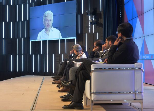A video link up with Julian Assange, journalist, founder and editor-in-chief of WikiLeaks, at the session, End of the Monopoly: The Open Information Age, held as part of the New Era of Journalism: Farewell to Mainstream international media forum at the Rossiya Segodnya International Multimedia Press Center. A video link up with Julian Assange, journalist, founder and editor-in-chief of WikiLeaks, at the session, End of the Monopoly: The Open Information Age, held as part of the New Era of Journalism: Farewell to Mainstream international media forum at the Rossiya Segodnya International Multimedia Press Center. - Sputnik International