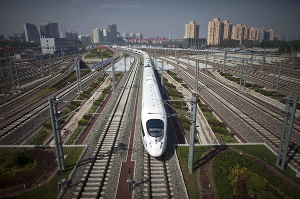 CRH high-speed train leaves the Beijing South Station for Shanghai during a test run on the Beijing-Shanghai high-speed railway in Beijing, China CRH high-speed train leaves the Beijing South Station for Shanghai during a test run on the Beijing-Shanghai high-speed railway in Beijing, China - Sputnik International