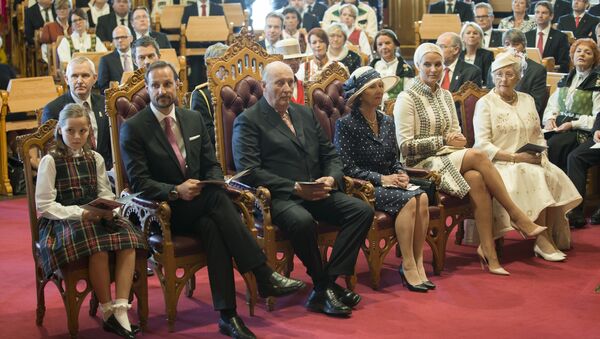 (From R to L) Norway`s Princess Astrid, Crown Princess Mette-Marit, Queen Sonja, King Harald, Crown Prince Haakon and Princess Ingrid Alexandra are seated inside the Norwegian parliament building in Oslo on May 15, 2014, during a celebratory session on the occasion of the bicentenary of the Norwegian Constitution - Sputnik International