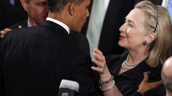 Former Secretary of State Hillary Rodham Clinton greets President Barack Obama after he delivered his State of the Union address on Capitol Hill in Washington. - Sputnik International