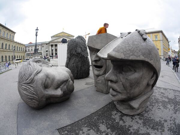 Fallen marble-like heads of European politicians in Munich's central Max-Joseph-Platz. Fallen marble-like heads of European politicians in Munich's central Max-Joseph-Platz. - Sputnik International