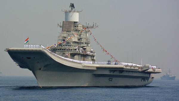 Indian Navy personnel stand on the INS Vikramaditya, a modified Kiev-class aircraft carrier, during the International Fleet Review in Visakhapatnam on February 6, 2016 - Sputnik International
