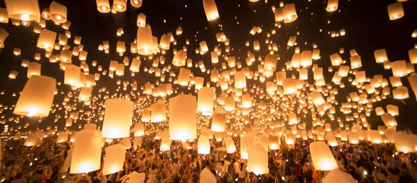 Lanterns are being released up the sky during a celebration prior to the Loy Kratong or floating festival in Chiang Mai province, northern Thailand (File) Lanterns are being released up the sky during a celebration prior to the Loy Kratong or floating festival in Chiang Mai province, northern Thailand (File) - Sputnik International