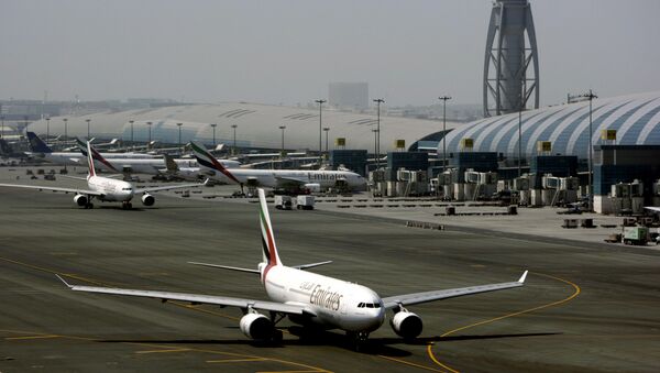 In Tuesday April 20, 2010 file photo, an Emirates airline passenger jet taxis on the tarmac at Dubai International airport in Dubai, United Arab Emirates - Sputnik International