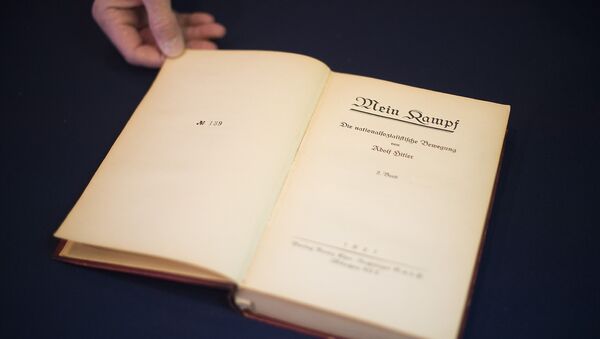 A copy of Nazi leader, Adolf Hitler's, political manifesto Mein Kampf, discovered at his Munich apartment and signed by eleven American officers, is on display March 18, 2016 before auction at Alexander Historical Auctions in Chesapeake City, Maryland - Sputnik International