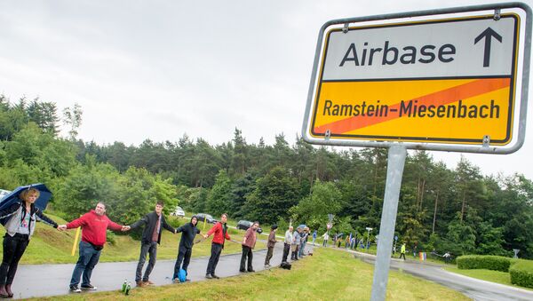 Activists attend a rally Stop-Ramstein on the road leading to US Air Force Base in Ramstein-Miesenbach on June 11, 2016 - Sputnik International