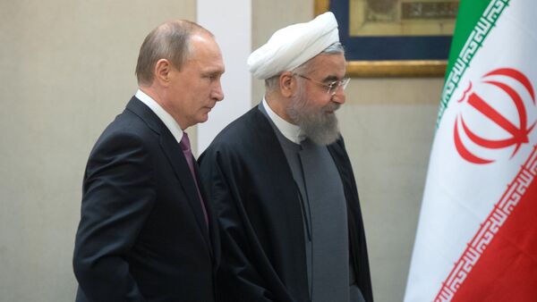 Russian President Vladimir Putin (left) and President of the Islamic Republic of Iran Hassan Rouhani at a news conference following the Russian-Iranian talks in Tehran (File) - Sputnik International