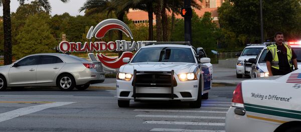 Police lock down Orange Avenue around Pulse nightclub, where people were killed by a gunman in a shooting rampage in Orlando, Florida June 12, 2016 Police lock down Orange Avenue around Pulse nightclub, where people were killed by a gunman in a shooting rampage in Orlando, Florida June 12, 2016 - Sputnik International