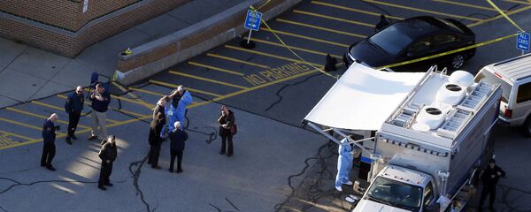 Officials are on the scene outside of Sandy Hook Elementary School in Newtown, Conn., where authorities say a gunman opened fire inside an elementary school in a shooting that left 27 people dead, including 20 children, Friday, Dec. 14, 2012 Officials are on the scene outside of Sandy Hook Elementary School in Newtown, Conn., where authorities say a gunman opened fire inside an elementary school in a shooting that left 27 people dead, including 20 children, Friday, Dec. 14, 2012 - Sputnik International