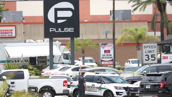 A police vehicle outside the Pulse nightclub, the scene of a mass shooting in Orlando, Florida, on June 12, 2016 - Sputnik International