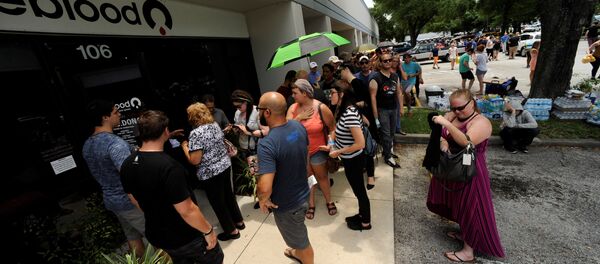 Hundreds of community members line up outside a clinic to donate blood after an early morning shooting attack at a gay nightclub in Orlando, Florida, U.S June 12, 2016 Hundreds of community members line up outside a clinic to donate blood after an early morning shooting attack at a gay nightclub in Orlando, Florida, U.S June 12, 2016 - Sputnik International