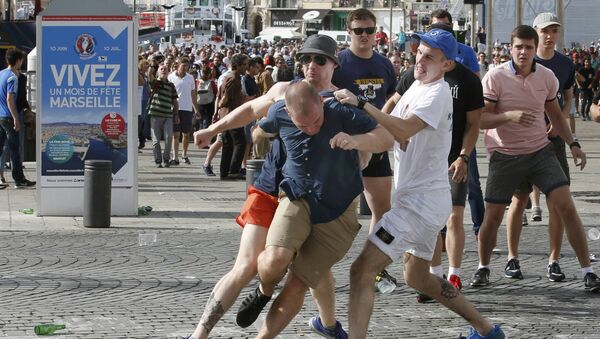 Football Soccer - Euro 2016 - England v Russia - Group B - Marseille, France - 11/6/16 Rival supporters clash at the old port of Marseille before the game. - Sputnik International
