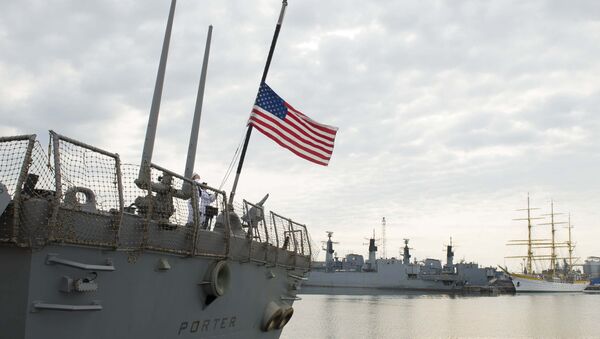 The American flag flies at half-mast aboard the guided-missile destroyer USS Porter (DDG 78) during a scheduled port visit to Constanta, Romania June 13, 2016. - Sputnik International