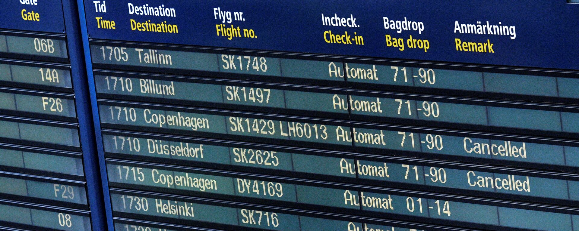 Cancelled SAS flights are seen on the information board at Arlanda airport, Sweden, June 13, 2016. - Sputnik International, 1920, 01.11.2021