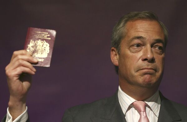 Leader of the United Kingdom Independence Party (UKIP) Nigel Farage holds his passport as he speaks at pro Brexit event in London, Britain June 3, 2016. Leader of the United Kingdom Independence Party (UKIP) Nigel Farage holds his passport as he speaks at pro Brexit event in London, Britain June 3, 2016. - Sputnik International