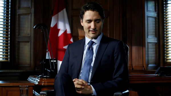Canada's Prime Minister Justin Trudeau pauses before the start of an interview with Reuters on Parliament Hill in Ottawa, Ontario, Canada, May 19, 2016. - Sputnik International