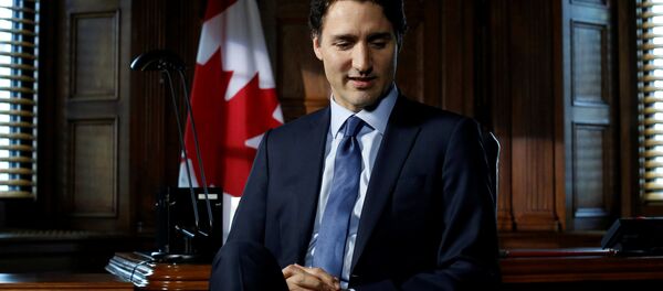 Canada's Prime Minister Justin Trudeau pauses before the start of an interview with Reuters on Parliament Hill in Ottawa, Ontario, Canada, May 19, 2016. - Sputnik International