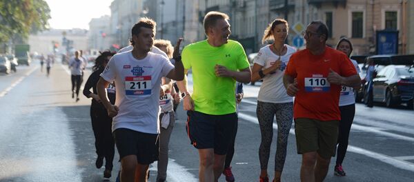 Presidential spokesman Dmitry Peskov, second left, during the SPIEF Race sporting event, organized as part of the St. Petersburg International Economic Forum Presidential spokesman Dmitry Peskov, second left, during the SPIEF Race sporting event, organized as part of the St. Petersburg International Economic Forum - Sputnik International