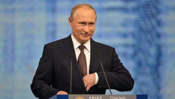 Russian President Vladimir Putin delivers his address at the plenary session of the St. Petersburg International Economic Forum. - Sputnik International