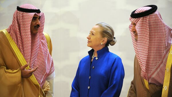 Saudi Foreign Minister Prince Saud Al-Faisal (R), US Secretary of State Hillary Clinton and Kuwaiti Foreign Minister Sheikh Sabah Khaled al-Hamad Al-Sabah speak prior to their group photo with other Gulf counetrparts during their meeting in the Saudi capital of Riyadh, on March 31, 2012 - Sputnik International