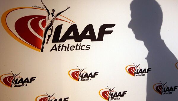 A man casts his shadow following a press conference by Sebastian Coe, IAAF's President, as part of the 203nd International Association of Athletics Federations (IAAF) council meeting in Monaco, March 11, 2016 - Sputnik International