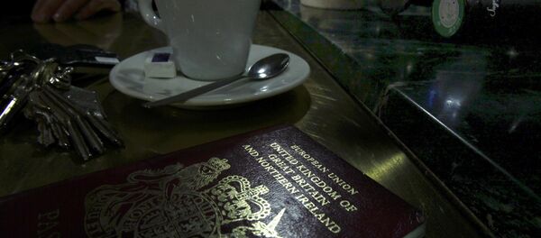 File photo illustration shows a European Union British Passport on the counter of a cafe in Paris. File photo illustration shows a European Union British Passport on the counter of a cafe in Paris. - Sputnik International
