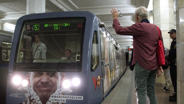 British actor Ian McKellen, right, greets the themed train Shakespeare Passions on the Moscow Metro. The train has been launched on Filyovskaya Line under the project Shakespeare Lives which is dedicated to the 400th anniversary of William Shakespeare's death and marks the UK-Russia Year of Language and Literature 2016. - Sputnik International