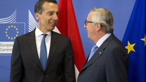 European Commission President Jean-Claude Juncker, right, greets Austrian Federal Chancellor Christian Kern prior to a meeting at EU headquarters in Brussels on Wednesday, June 22, 2016. - Sputnik International