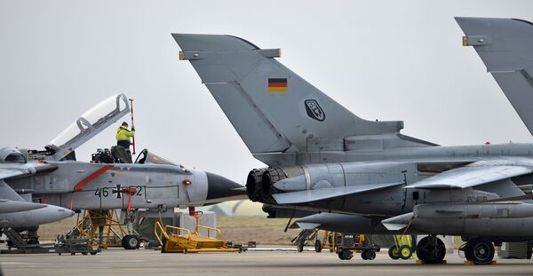 A technician works on a German Tornado jet at the NATO air base in Incirlik, Turkey. A technician works on a German Tornado jet at the NATO air base in Incirlik, Turkey. - Sputnik International