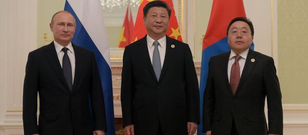 Presidents Vladimir Putin of Russia, Xi Jinping of China and Tsakhiagiin Elbegdorj of Mongolia meeting in Tashkent Presidents Vladimir Putin of Russia, Xi Jinping of China and Tsakhiagiin Elbegdorj of Mongolia meeting in Tashkent - Sputnik International