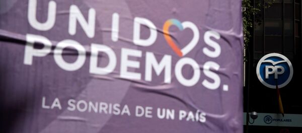 Posters of the coalition of Unidos Podemos (United We Can) hang near the People's Party (PP) headquarters in Madrid, Spain Posters of the coalition of Unidos Podemos (United We Can) hang near the People's Party (PP) headquarters in Madrid, Spain - Sputnik International