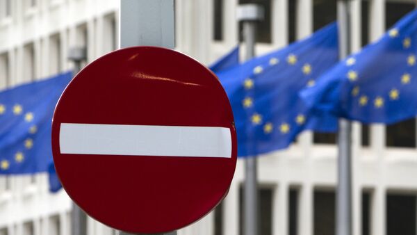 EU flags flutter in the wind in back of a no entry street sign in front of EU headquarters in Brussels on Friday, June 24, 2016. - Sputnik International