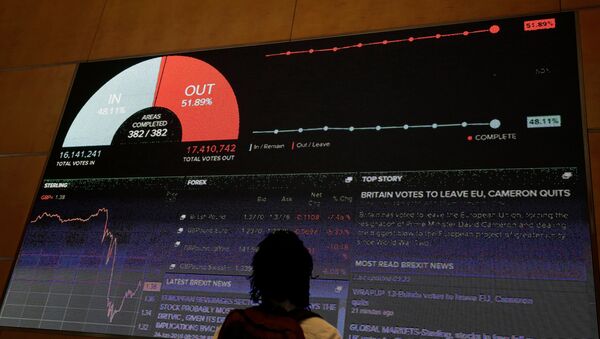 A screen shows the referendum result and market information at Thomson Reuters offices in London, Britain June 24, 2016 after Britain voted to leave the European Union. - Sputnik International