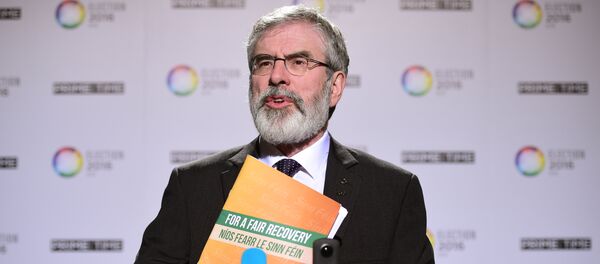 Republican party Sinn Fein leader Gerry Adams addresses journalists as he attends the final televised debate in Dublin. (File) Republican party Sinn Fein leader Gerry Adams addresses journalists as he attends the final televised debate in Dublin. (File) - Sputnik International
